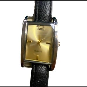 Sophisticated Gold & Black Quartz Watch with a second hand. New with Battery